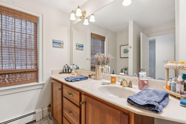 bathroom featuring vanity and a baseboard heating unit