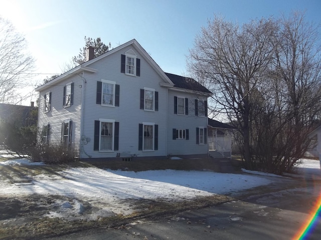 colonial home with a chimney