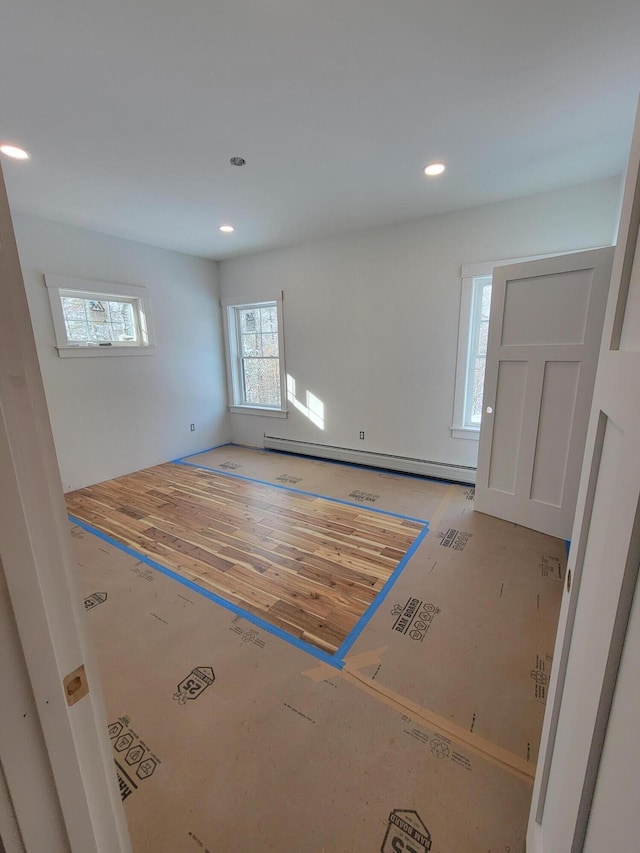 entrance foyer featuring a baseboard radiator