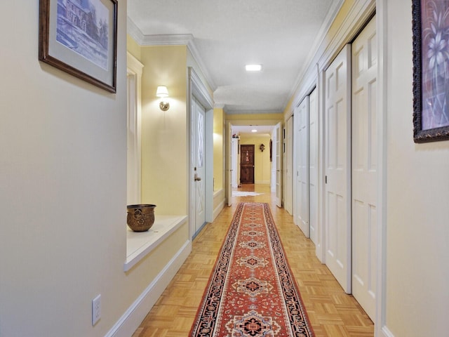 corridor featuring light parquet flooring and ornamental molding