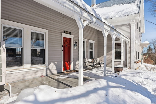 view of snow covered patio