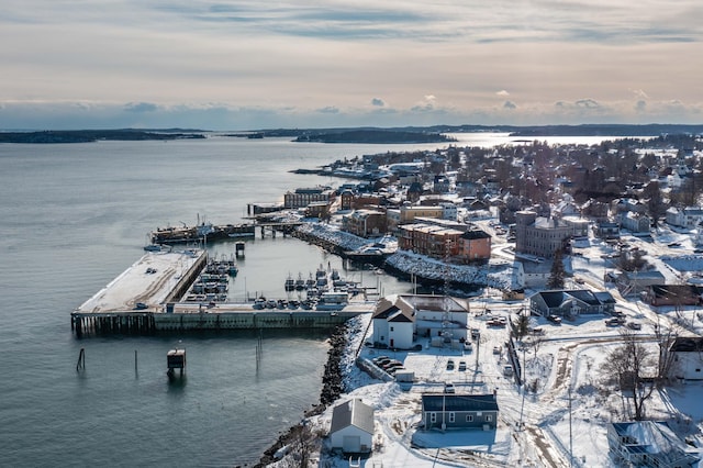 aerial view at dusk with a water view