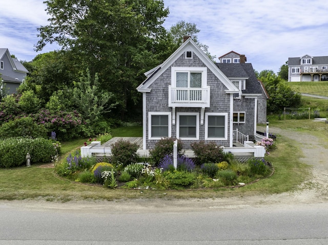 194 Water St, Eastport, ME 04631 - shingle-style home featuring a balcony and a front yard
