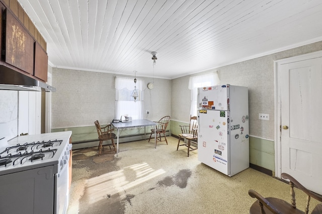 kitchen featuring crown molding, white appliances, a baseboard radiator, and pendant lighting