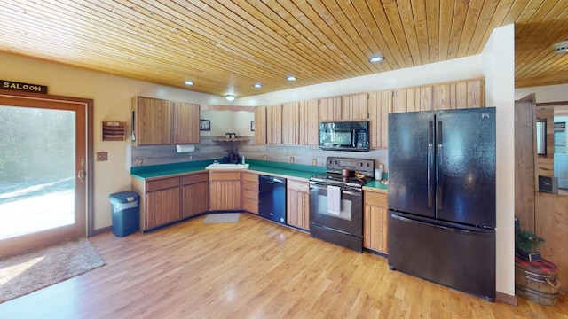 kitchen featuring wooden ceiling, sink, light hardwood / wood-style flooring, and black appliances