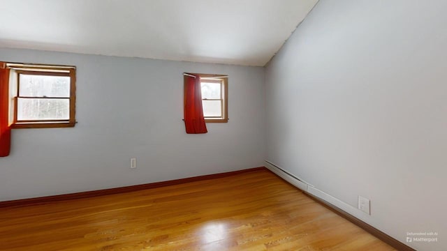 spare room featuring light hardwood / wood-style floors