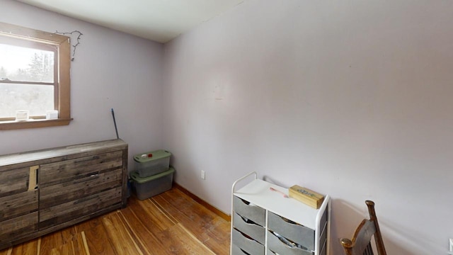 bedroom with light wood-type flooring