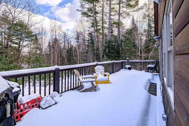 view of snow covered deck