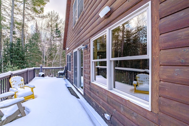 view of snow covered deck