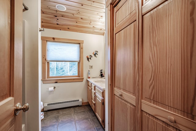 bathroom featuring toilet, vaulted ceiling, wooden ceiling, a baseboard radiator, and vanity