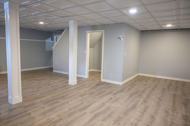 basement featuring light wood-type flooring