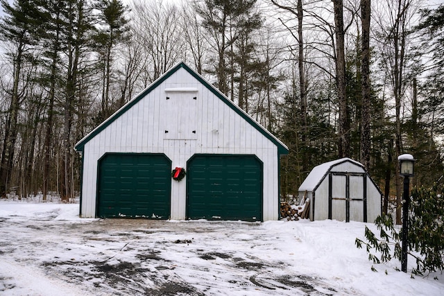 view of snow covered garage