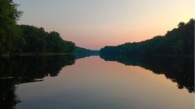 590 Mohawk Rd, Lincoln, ME 04457 - water view with a heavily wooded area