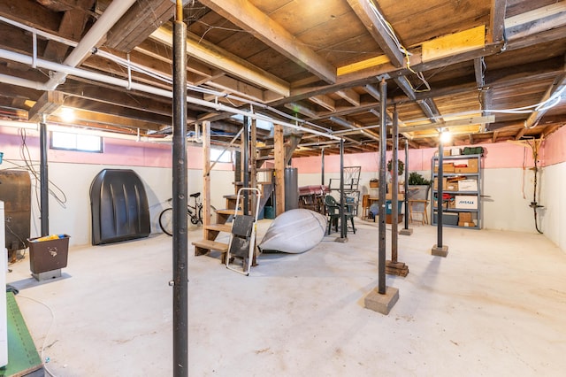 basement featuring gas water heater