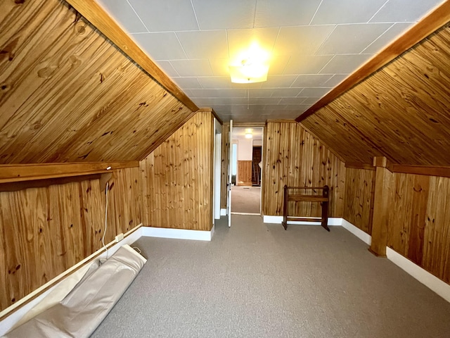 bonus room featuring lofted ceiling and carpet floors