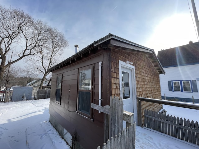 view of snow covered property