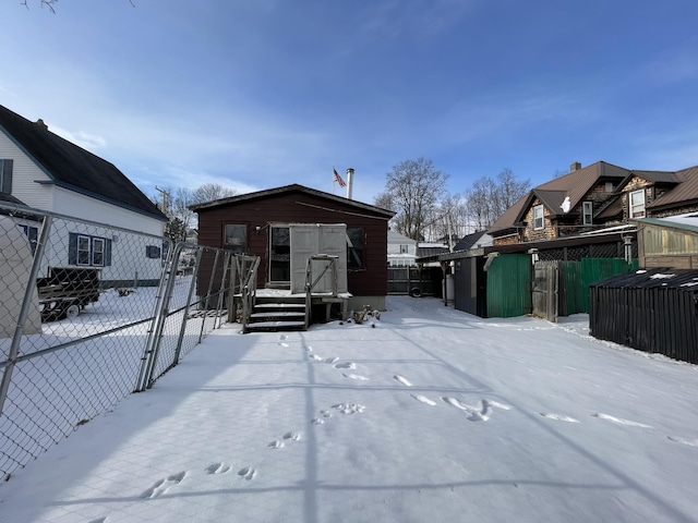 view of snow covered house