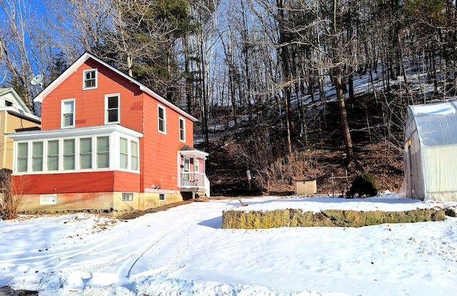 view of snow covered property