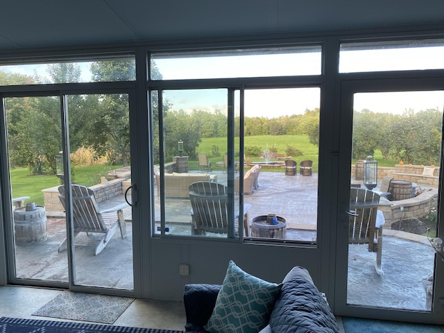 doorway to outside featuring plenty of natural light