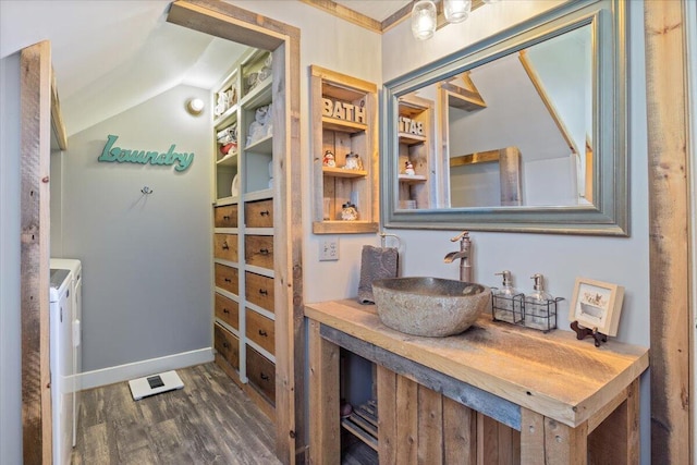 interior space featuring a sink and washer and clothes dryer