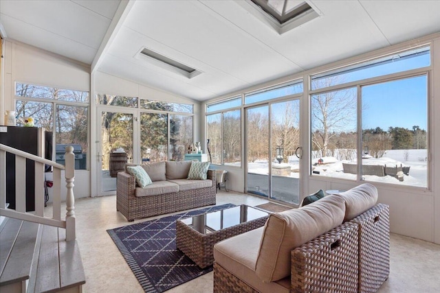 sunroom / solarium featuring vaulted ceiling