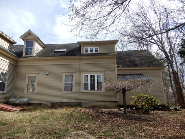 47 High Rd, Cornish, ME 04020 - view of home's exterior featuring roof with shingles