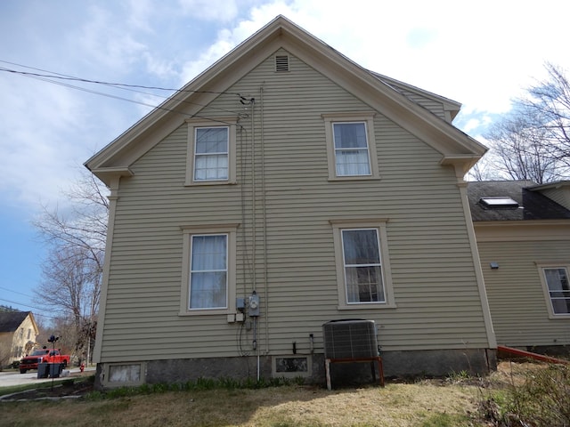 47 High Rd, Cornish, ME 04020 - back of property featuring central air condition unit
