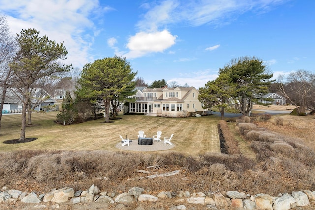 exterior space featuring an outdoor fire pit
