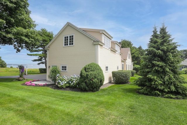 22 Channel Cove Ln, Biddeford, ME 04005 - view of side of home featuring a lawn