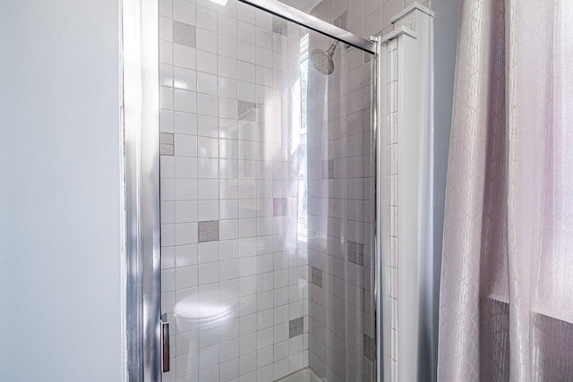 bathroom featuring walk in shower