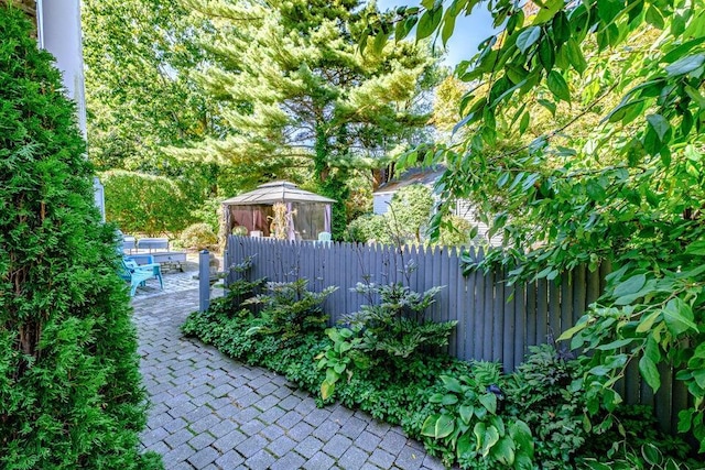 view of yard featuring a gazebo and a patio