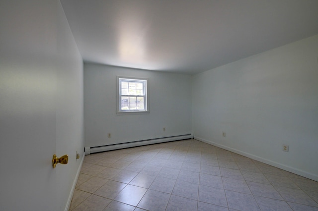 3 Sea Breeze Ave, Biddeford, ME 04005 - unfurnished room with a baseboard heating unit and light tile patterned floors