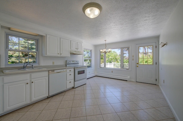 3 Sea Breeze Ave, Biddeford, ME 04005 - kitchen featuring white appliances, a baseboard heating unit, a chandelier, light countertops, and under cabinet range hood