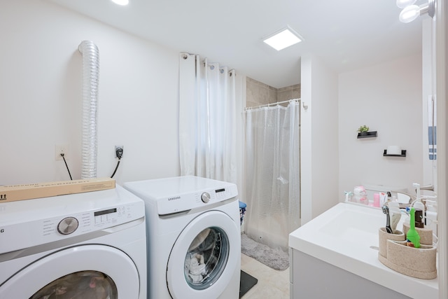 clothes washing area with independent washer and dryer