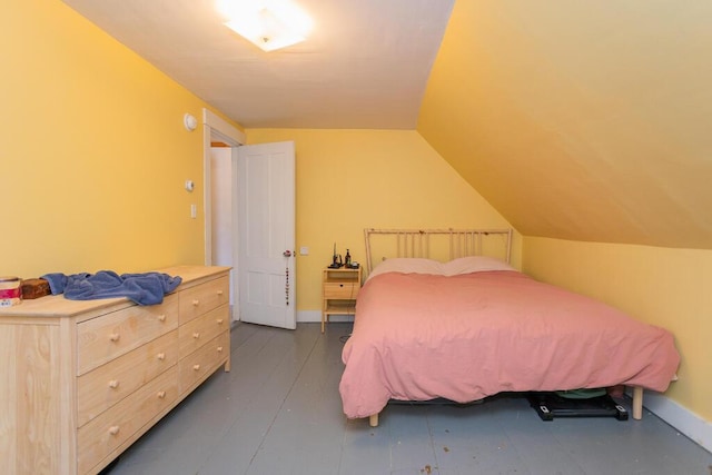 bedroom featuring vaulted ceiling