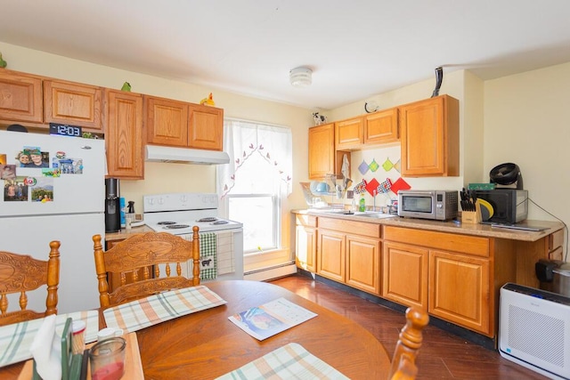 kitchen featuring a baseboard radiator, dark hardwood / wood-style flooring, sink, and white appliances