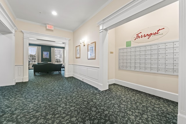 hallway featuring dark carpet and ornamental molding