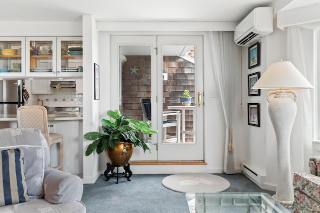 doorway featuring carpet flooring, baseboard heating, and a wall mounted air conditioner