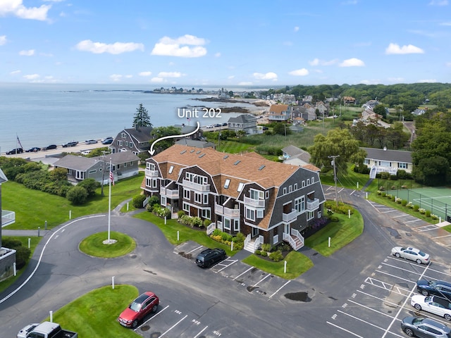 bird's eye view with a water view and a residential view