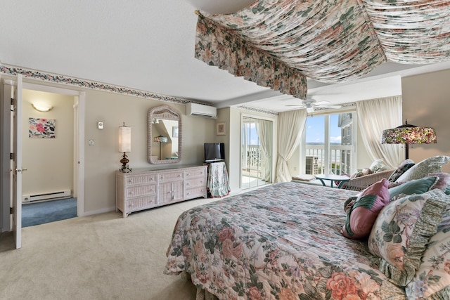 bedroom with a wall unit AC, baseboards, a baseboard radiator, access to exterior, and carpet flooring