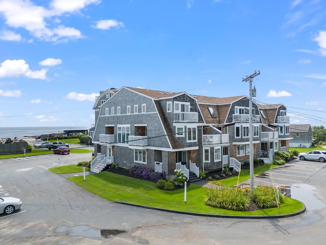 view of property with uncovered parking