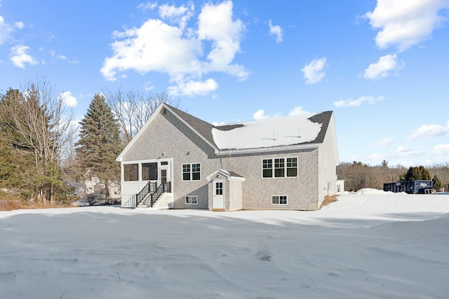 view of snow covered property