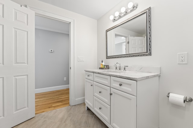 bathroom with vanity and tile patterned flooring