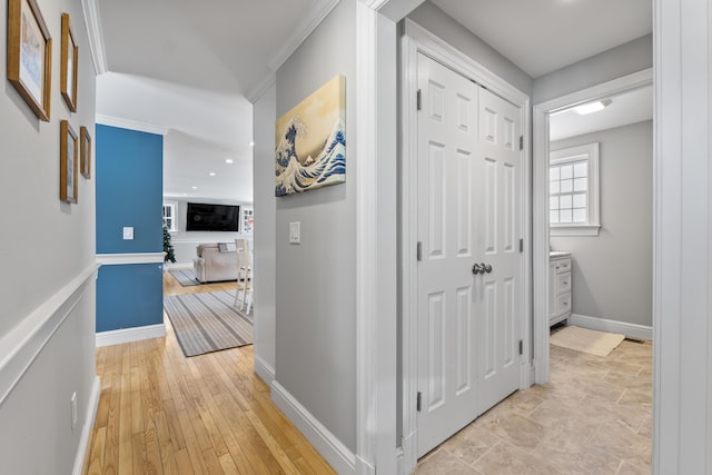 hall with light hardwood / wood-style floors