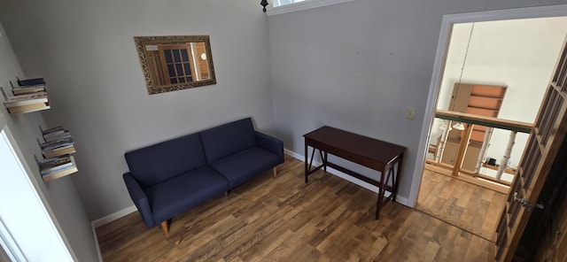 living area with dark hardwood / wood-style flooring