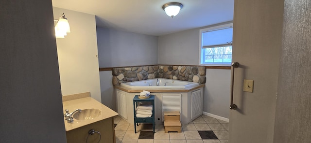 bathroom with vanity, a tub to relax in, and tile patterned floors