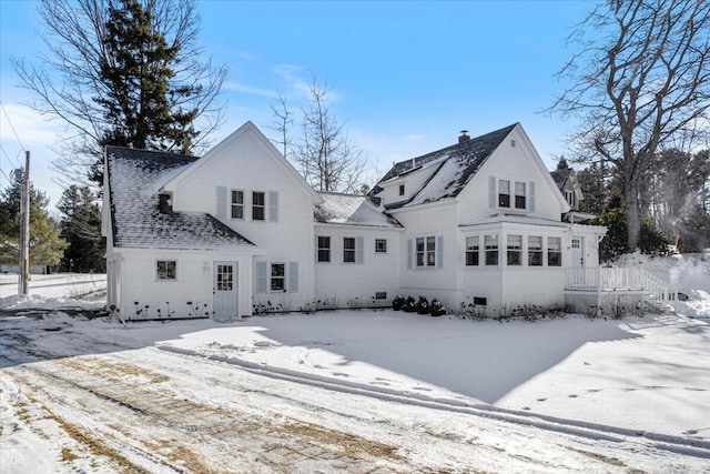 view of snow covered property