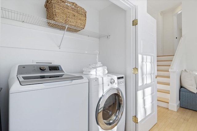 laundry area featuring separate washer and dryer