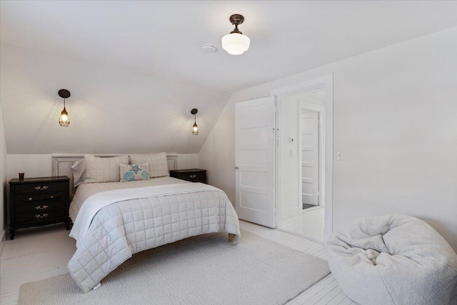 bedroom with vaulted ceiling