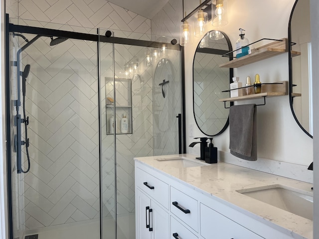 bathroom with vanity and an enclosed shower